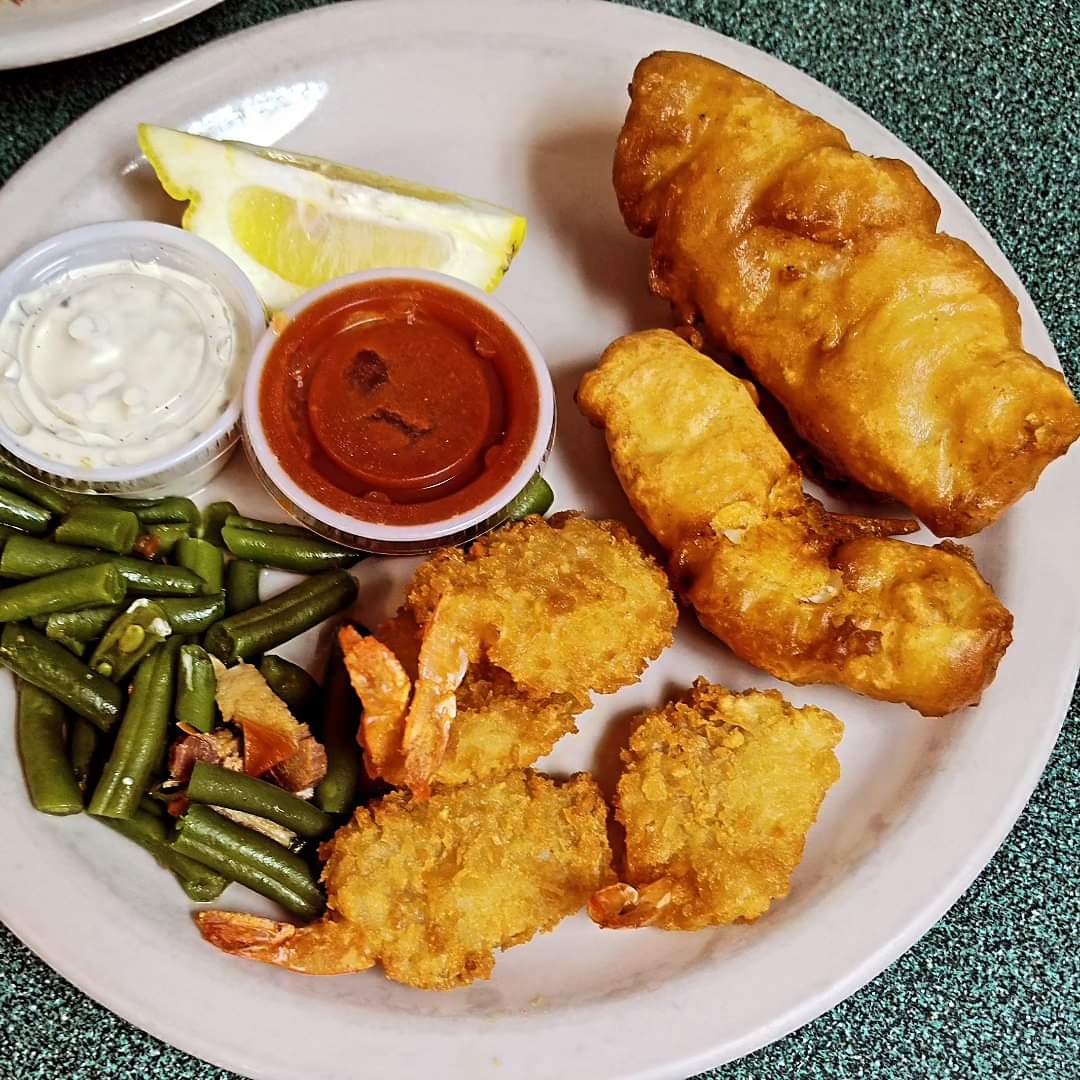 Fried fish and shrimp platter with tartar and cocktail sauce