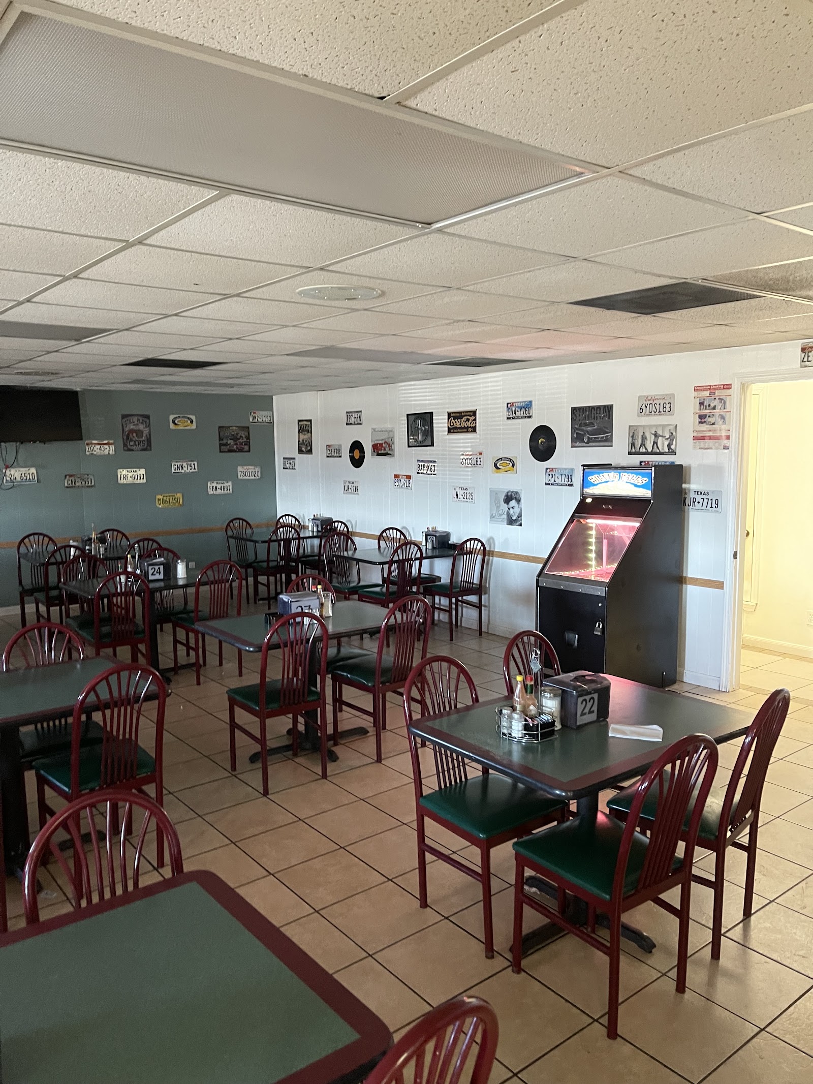 Dining room at Baldy's American Diner with retro license plate decor and jukebox